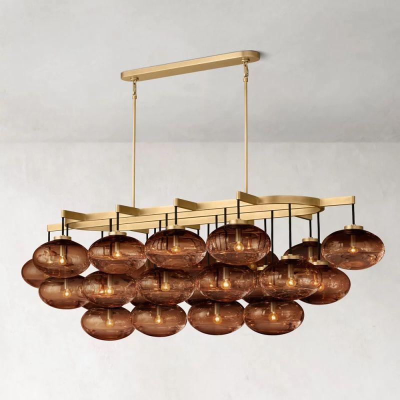 Cabrette Linear Chandelier 72" in Natural Brass with Champagne Gold glass