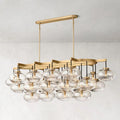 Cabrette Linear Chandelier 72" in Natural Brass with Clear glass