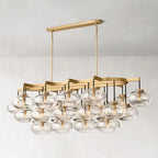 Cabrette Linear Chandelier 72" in Natural Brass with Clear glass