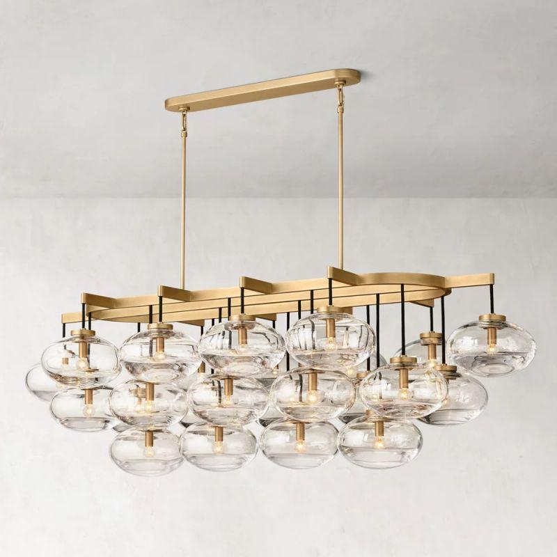 Cabrette Linear Chandelier 72" in Natural Brass with Clear glass